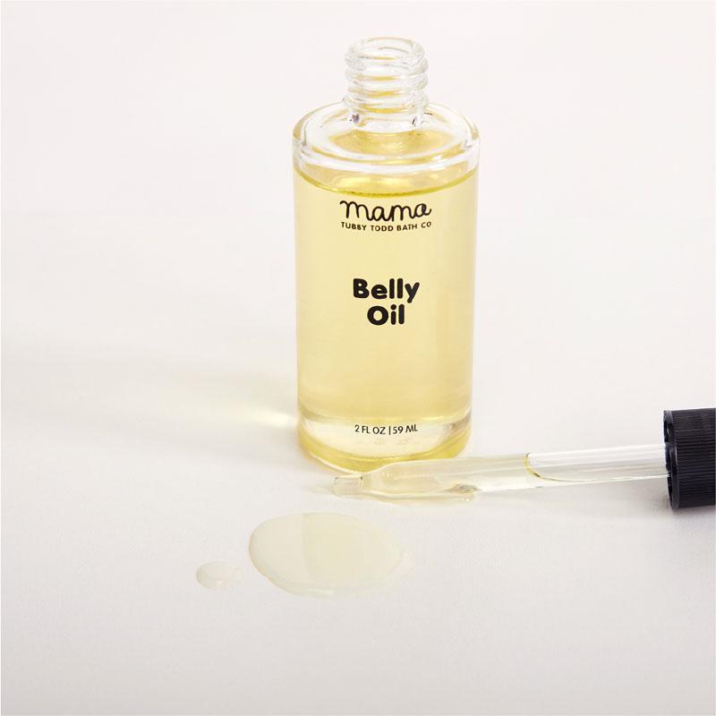 Belly Oil jar next to some oil on table to show texture